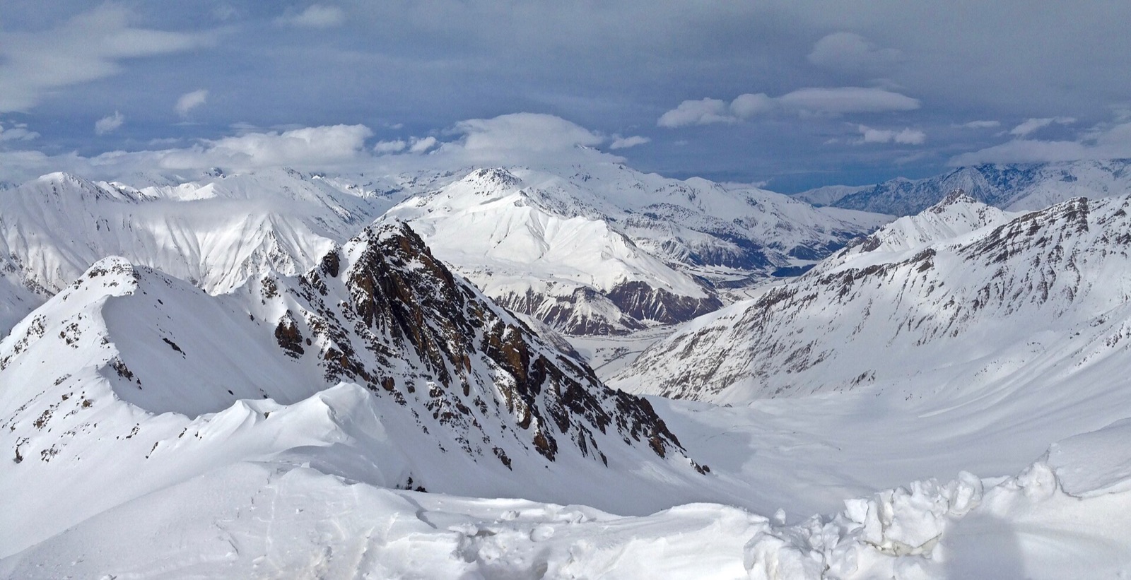 Snow-covered ridges and peaks of the Greater Caucasus above the Gudauri ski area in Georgia